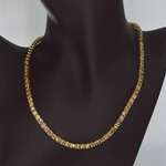 Gouden tennis collier met champagne en natuurlijke cognac diamanten