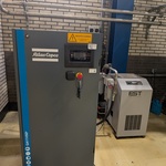 Compressor met conditionerinsunit en met waterafscheider, Atlas Copco