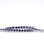 Witgouden tennisarmband met saffieren