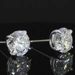 Witgouden solitair oorbellen met diamanten