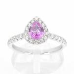 Witgouden entourage ring met een roze saffier