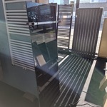 Glasradiator Novellini, elektrisch, zwart glas