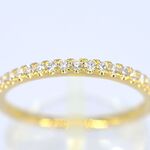 Gouden rijring met briljant geslepen diamant