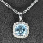 Witgouden entourage hanger bezet met topaas en diamanten, excl. kettin