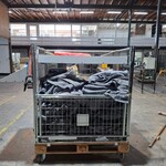 Partij verhuisdekens in transportkar