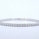 Witgouden armband met briljant geslepen diamanten en een onzichtbare s