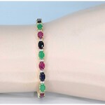 Gouden tennisarmband met diamanten, saffier, robijn en smaragd
