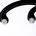 Solitair diamanten oorbellen met goud en platina