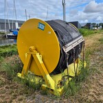 Haspel met olieopvangscherm