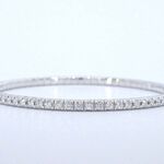 Witgouden armband met briljant geslepen diamanten en een onzichtbare s