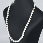 Parelsnoer met gouden sluiting met diamant