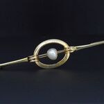 Gouden broche met orient parel