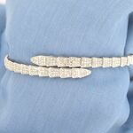 Witgouden armband van serpent model met natuurlijke diamanten