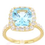 Gouden entourage ring met natuurlijke topaas en diamanten