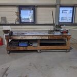 Verrijdbare werkbank met inhoud