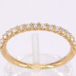 Gouden rijring bezet met briljant geslepen diamanten