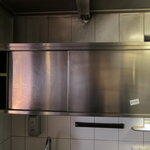 Wall cabinet with sliding doors