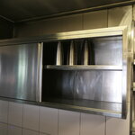 Wall cabinet with wall rack