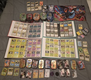 Grote Pokémon verzameling – o.a. vintage kaarten, mappen en tins