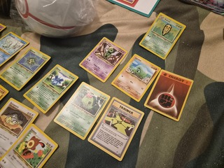 Pokémon mega collectie met o.a. vintage kaarten, 4 gevulde mappen, tin