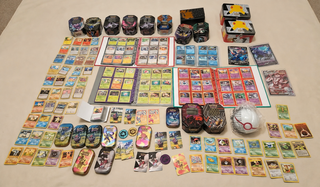 Pokémon mega collectie met o.a. vintage kaarten, 4 gevulde mappen, tin