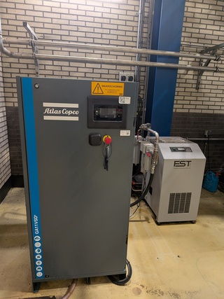Compressor met conditionerinsunit en met waterafscheider, Atlas Copco