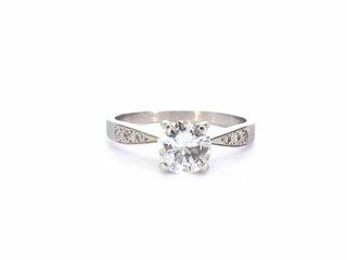 Gouden solitair ring met een 1.00 carat natuurlijke diamant en briljan