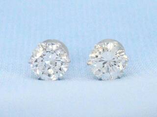 Witgouden solitaire oorbellen met diamanten 2.09 carat