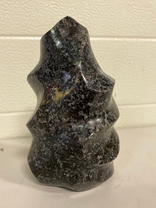 Mystic Merliniet sculptuur vlamvorm