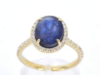 Gouden entourage ring met diamanten en saffier