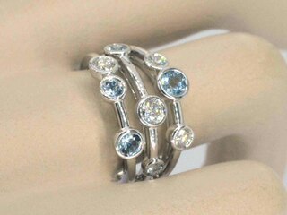 Witgouden design ring met aquamarijn en diamant