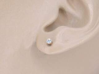 Rosegouden oorbellen met diamant