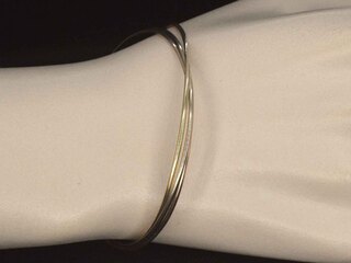 Armband met drie kleuren goud