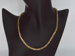 Gouden exclusieve tennis collier met champagne en cognac diamanten