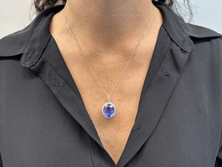 Witgouden hanger met diamanten en een tanzaniet