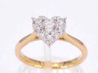 Gouden ring met diamanten in hart vorm