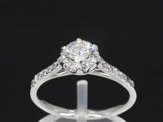 Platina ring met een 0.90 carat GIA diamant en briljant geslepen diama