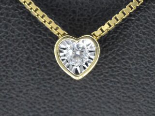 Gouden hanger met een briljant geslepen diamant in hartvorm, excl. ket