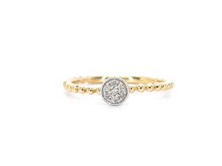 Gouden ring met centraal een rondje vol gezet met diamanten