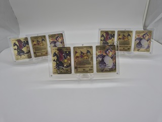 3x Metalen Charizard kaarten in luxe acryl display