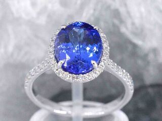 Gouden ring met diamant en tanzaniet