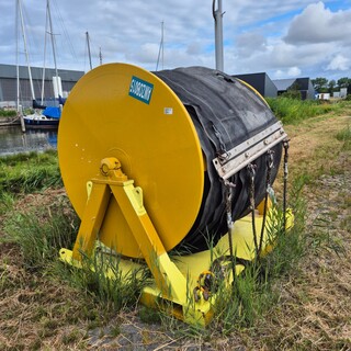 Haspel met olieopvangscherm