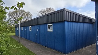 Containerunits met kleed en sanitair voorzieningen