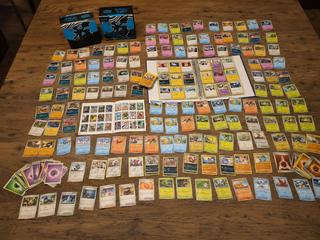 Grote Pokémon kaartenverzameling met Black Bolt, map en accessoires