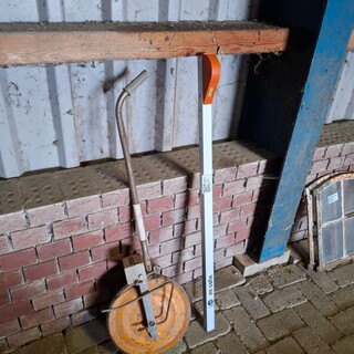 Meetwiel met telescopische meetstok