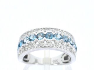 Witgouden pave ring met diamanten en topaas