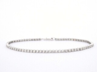 Witgouden tennis armband met natuurlijke diamanten