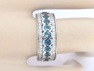 Witgouden pave ring met diamanten en topaas