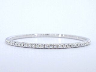 Witgouden armband met briljant geslepen diamanten en een onzichtbare s