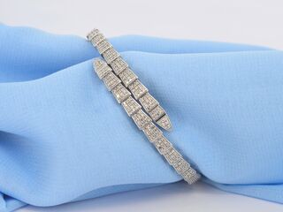 Witgouden armband van serpent model met natuurlijke diamanten